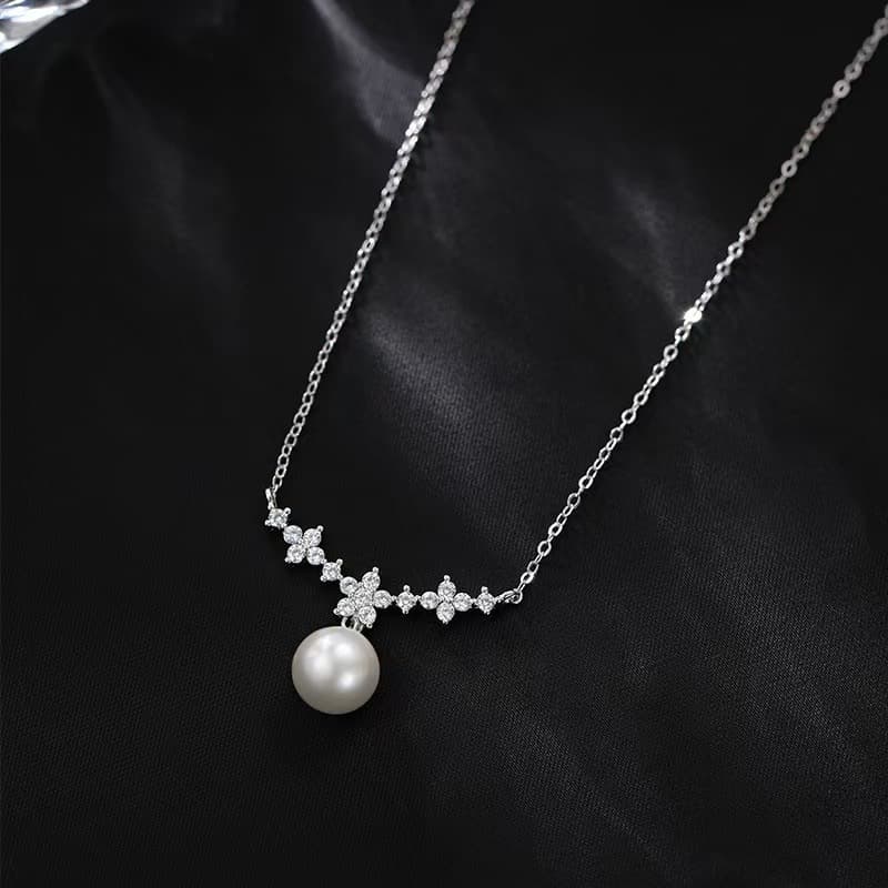 結婚式 アクセサリー 上品な真珠とフラワーモチーフのネックレス