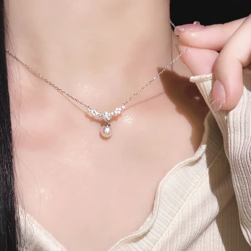結婚式 アクセサリー 上品な真珠とフラワーモチーフのネックレス